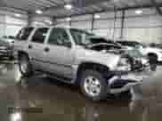 2003 Chevrolet Tahoe LS with VIN 1GNEK13V03J300463, listed as a Copart auction lot 65970125 with 74,950 mi miles and Salvage title. Bid and sale history available at DreamBid. Image 4.