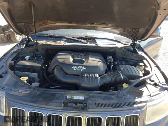 2014 Jeep Grand Cherokee Laredo with VIN 1C4RJEAG8EC141157, listed as a IAAI auction lot 43370151 with 163,137 mi miles and . Bid and sale history available at DreamBid. Image 10.