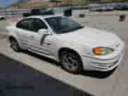 2002 Pontiac Grand Am GT z VIN 1G2NW52E42M549744, wystawiony jako Copart lot #57678605 z przebiegiem 220 067 mil mil oraz Szkoda całkowita • Salvage title. Historia ofert i sprzedaży dostępna na DreamBid. Obrazek 4.