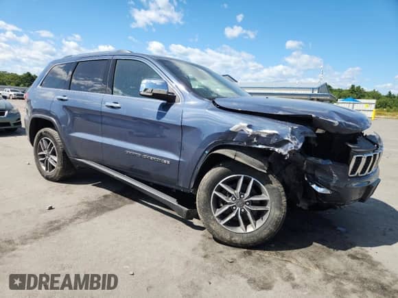 2020 Jeep Grand Cherokee Limited with VIN 1C4RJFBG6LC233935, listed as a Copart auction lot 69943165 with 138,032 mi miles and Salvage title. Bid and sale history available at DreamBid. Image 4.