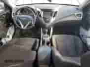 2015 Hyundai Veloster z VIN KMHTC6AD0FU237545, wystawiony jako Copart lot #69858765 z przebiegiem 182 058 mil mil oraz Szkoda całkowita • Salvage title. Historia ofert i sprzedaży dostępna na DreamBid. Obrazek 8.