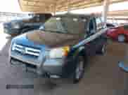 2006 Honda Pilot EX-L with VIN 5FNYF18746B013563, listed as a IAAI auction lot 42604056 with 250,068 mi miles and . Bid and sale history available at DreamBid. Image 2.