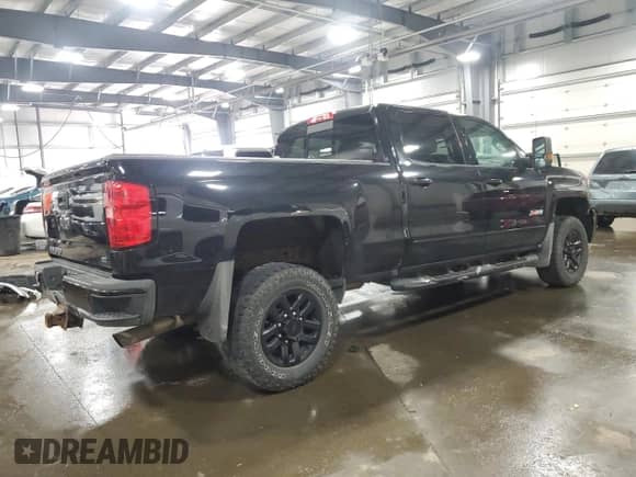 2018 Chevrolet Silverado 2500HD LTZ с VIN 1GC1KWEG8JF145258, выставлен на аукционе Copart как лот 68921115 с пробегом 96 594 миль миль и Списание • Salvage title. История ставок и продаж доступна на DreamBid. Изображение 3.