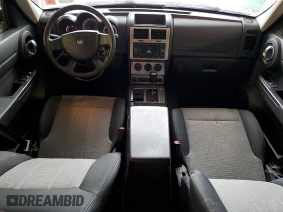 2009 Dodge Nitro SXT с VIN 1D8GU28KX9W539757, выставлен на аукционе Copart как лот 51431584 с пробегом 180 657 миль миль и На запчасти • Non repairable. История ставок и продаж доступна на DreamBid. Изображение 8.