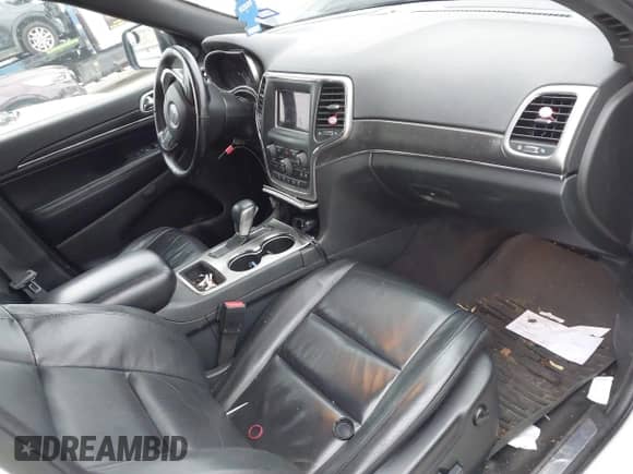 2018 Jeep Grand Cherokee Sterling with VIN 1C4RJEBG5JC221735, listed as a IAAI auction lot 42182575 with 123,505 mi miles and . Bid and sale history available at DreamBid. Image 5.