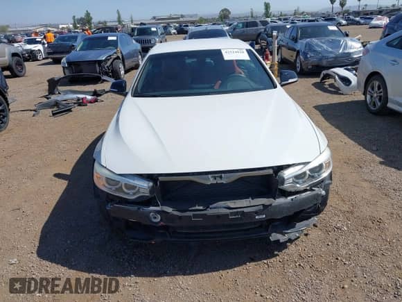 2015 BMW 4 Series 428i with VIN WBA3V7C58FP771642, listed as a IAAI auction lot 42524828 with 64,440 mi miles and . Bid and sale history available at DreamBid. Image 13.