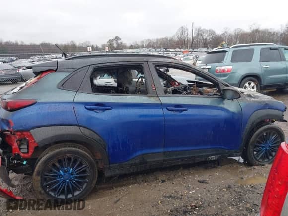 2021 Hyundai Kona SEL with VIN KM8K22AA8MU746311, listed as a IAAI auction lot 41554646 with 63,322 mi miles and . Bid and sale history available at DreamBid. Image 12.