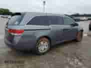 2014 Honda Odyssey LX z VIN 5FNRL5H28EB126388, wystawiony jako Copart lot #70583975 z przebiegiem 148 425 mil mil oraz Szkoda całkowita • Salvage title. Historia ofert i sprzedaży dostępna na DreamBid. Obrazek 3.