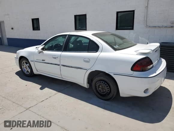 2002 Pontiac Grand Am GT z VIN 1G2NW52E42M549744, wystawiony jako Copart lot #57678605 z przebiegiem 220 067 mil mil oraz Szkoda całkowita • Salvage title. Historia ofert i sprzedaży dostępna na DreamBid. Obrazek 2.