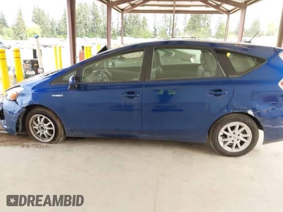 2015 Toyota Prius Two z VIN JTDZN3EU6FJ036865, wystawiony jako IAAI lot #42215198 z przebiegiem 50 330 mil mil oraz . Historia ofert i sprzedaży dostępna na DreamBid. Obrazek 14.