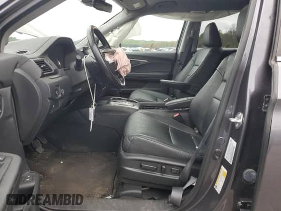 2021 Honda Pilot EX-L z VIN 5FNYF6H51MB062521, wystawiony jako Copart lot #69946005 z przebiegiem 74 560 mil mil oraz Szkoda całkowita • Salvage title. Historia ofert i sprzedaży dostępna na DreamBid. Obrazek 7.