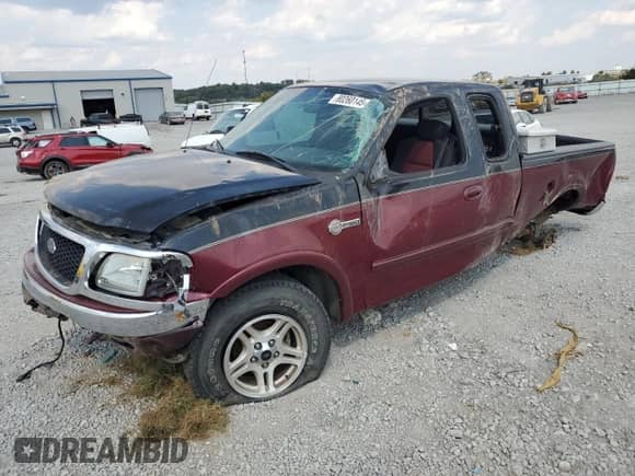 2003 Ford F-150 XL with VIN 1FTRX18L23NB11079, listed as a Copart auction lot 80260145 with 167,209 mi miles and Salvage title. Bid and sale history available at DreamBid. Image 1.
