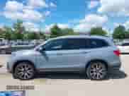 2022 Honda Pilot Touring 7-Passenger z VIN 5FNYF5H6XNB019297, wystawiony jako IAAI lot #43086671 z przebiegiem 29 833 mil mil oraz . Historia ofert i sprzedaży dostępna na DreamBid. Obrazek 14.