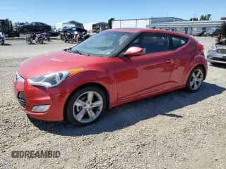 2014 Hyundai Veloster z VIN KMHTC6AD6EU192710, wystawiony jako Copart lot #72075825 z przebiegiem 119 281 mil mil oraz Czysty tytuł • Clean title. Historia ofert i sprzedaży dostępna na DreamBid. Obrazek 1.
