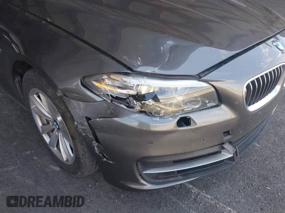 2014 BMW 5 Series 528i z VIN WBA5A5C5XED501501, wystawiony jako IAAI lot #43063194 z przebiegiem 145 415 mil mil oraz . Historia ofert i sprzedaży dostępna na DreamBid. Obrazek 6.