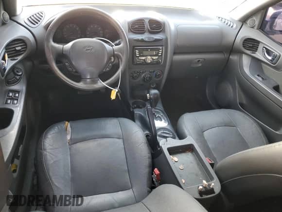 2001 Hyundai Santa Fe GLS z VIN KM8SC83D11U129013, wystawiony jako Copart lot #78885494 z przebiegiem 168 175 mil mil oraz Szkoda całkowita • Salvage title. Historia ofert i sprzedaży dostępna na DreamBid. Obrazek 8.