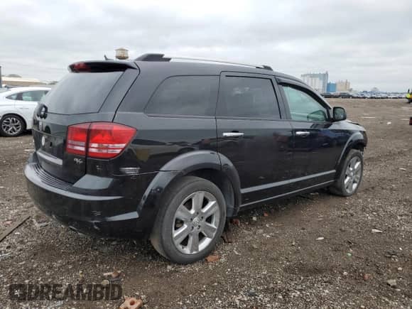 2009 Dodge Journey R/T with VIN 3D4GH67V99T140126, listed as a Copart auction lot 57692625 with 120,309 mi miles and Salvage title. Bid and sale history available at DreamBid. Image 3.