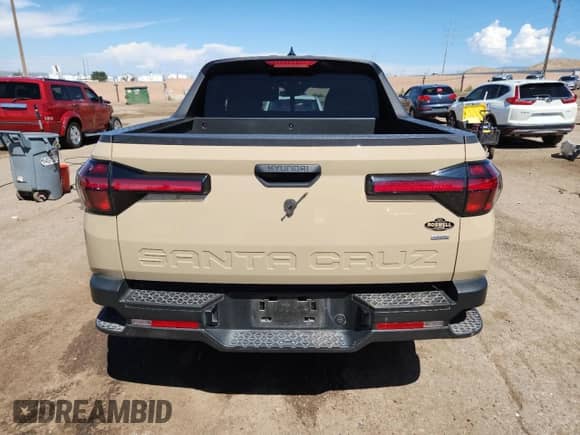 2024 Hyundai Santa Cruz SEL с VIN 5NTJBDDE0RH111810, выставлен на аукционе Copart как лот 80141545 с пробегом 23 406 миль миль и Списание • Salvage title. История ставок и продаж доступна на DreamBid. Изображение 6.