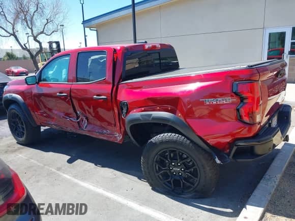 2023 Chevrolet Colorado 4WD Trail Boss с VIN 1GCPTEEK7P1185939, выставлен на аукционе IAAI как лот 41884598 с пробегом 3 476 миль миль и . История ставок и продаж доступна на DreamBid. Изображение 15.