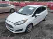 2014 Ford Fiesta S z VIN 3FADP4TJ1EM191222, wystawiony jako IAAI lot #42456575 z przebiegiem 110 969 mil mil oraz . Historia ofert i sprzedaży dostępna na DreamBid. Obrazek 2.