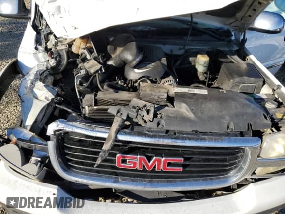 2001 GMC Sierra 1500 SLE z VIN 1GTEK19T01E336805, wystawiony jako Copart lot #82631185 z przebiegiem 223 096 mil mil oraz Szkoda całkowita • Salvage title. Historia ofert i sprzedaży dostępna na DreamBid. Obrazek 11.