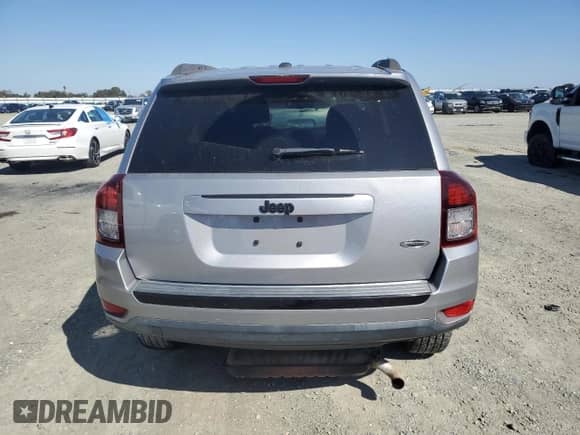 2014 Jeep Compass Sport with VIN 1C4NJCBA8ED822930, listed as a Copart auction lot 81718935 with 126,687 mi miles and Salvage title. Bid and sale history available at DreamBid. Image 6.