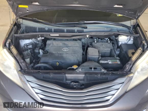 2013 Toyota Sienna XLE with VIN 5TDYK3DC2DS394056, listed as a Copart auction lot 85862335 with 202,863 mi miles and Salvage title. Bid and sale history available at DreamBid. Image 12.