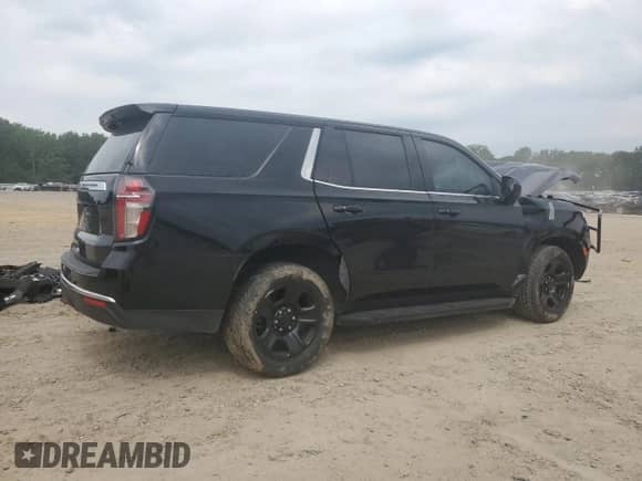 2022 Chevrolet Tahoe Commercial with VIN 1GNSKLED4NR218484, listed as a Copart auction lot 59113605 with 23,845 mi miles and Salvage title. Bid and sale history available at DreamBid. Image 3.