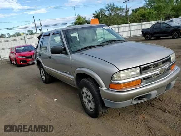 2003 Chevrolet Blazer LS with VIN 1GNDT13X73K152980, listed as a Copart auction lot 71448015 with 102,250 mi miles and Salvage title. Bid and sale history available at DreamBid. Image 13.