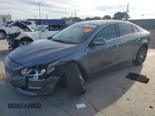 2017 Volvo S60 Inscription с VIN LYV402HK8HB143019, выставлен на аукционе Copart как лот 65034585 с пробегом 52 962 миль миль и Чистый • Clean title. История ставок и продаж доступна на DreamBid. Изображение 1.