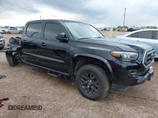 2023 Toyota Tacoma SR5 with VIN 3TMAZ5CN8PM219990, listed as a IAAI auction lot 43214288 with 26,428 mi miles and . Bid and sale history available at DreamBid. Image 1.