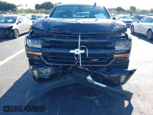 2017 Chevrolet Silverado 1500 LT with VIN 1GCUKREC3HF235469, listed as a IAAI auction lot 43219480 with 86,908 mi miles and . Bid and sale history available at DreamBid. Image 6.