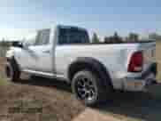 2014 Ram 1500 Laramie z VIN 1C6RR7JM3ES398766, wystawiony jako Copart lot #81518925 z przebiegiem 95 954 mil mil oraz Szkoda całkowita • Salvage title. Historia ofert i sprzedaży dostępna na DreamBid. Obrazek 2.