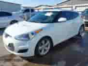 2013 Hyundai Veloster w/Gray Int z VIN KMHTC6AD3DU092515, wystawiony jako IAAI lot #43308569 z przebiegiem 141 807 mil mil oraz . Historia ofert i sprzedaży dostępna na DreamBid. Obrazek 20.