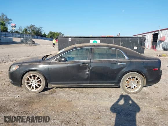 2012 Chevrolet Malibu LTZ 1LZ z VIN 1G1ZE5E07CF208739, wystawiony jako IAAI lot #43373080 z przebiegiem 157 844 mil mil oraz . Historia ofert i sprzedaży dostępna na DreamBid. Obrazek 14.