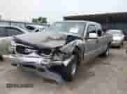 2002 GMC Sierra 1500 SLE с VIN 2GTEC19V121171588, выставлен на аукционе IAAI как лот 43076307 с пробегом 117 879 миль миль и . История ставок и продаж доступна на DreamBid. Изображение 2.