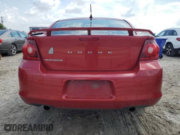 2014 Dodge Avenger SE z VIN 1C3CDZAG5EN174839, wystawiony jako Copart lot #70292304 z przebiegiem 167 045 mil mil oraz Szkoda całkowita • Salvage title. Historia ofert i sprzedaży dostępna na DreamBid. Obrazek 6.