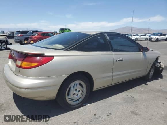 1997 Saturn SC с VIN 1G8ZG1277VZ308296, выставлен на аукционе Copart как лот 59011285 с пробегом 250 576 миль миль и Списание • Salvage title. История ставок и продаж доступна на DreamBid. Изображение 3.