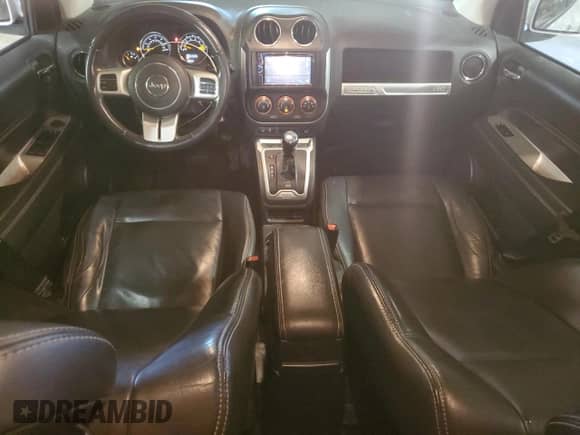2015 Jeep Compass High Altitude с VIN 1C4NJDEB7FD245402, выставлен на аукционе Copart как лот 63697055 с пробегом 136 594 миль миль и Списание • Salvage title. История ставок и продаж доступна на DreamBid. Изображение 8.