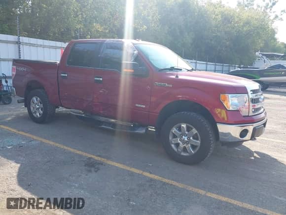 2013 Ford F-150 Lariat with VIN 1FTFW1ET5DKD04467, listed as a IAAI auction lot 43355676 with 124,871 mi miles and . Bid and sale history available at DreamBid. Image 1.