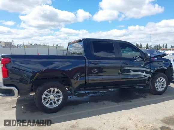 2024 Chevrolet Silverado 1500 LT with VIN 1GCUDDED4RZ259382, listed as a IAAI auction lot 41820720 with 13,202 mi miles and . Bid and sale history available at DreamBid. Image 14.