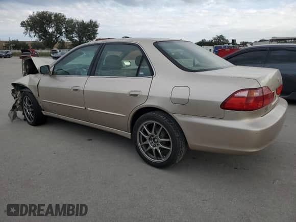 2000 Honda Accord with VIN JHMCG5564YC033420, listed as a Copart auction lot 75862984 with 178,685 mi miles and Salvage title. Bid and sale history available at DreamBid. Image 2.