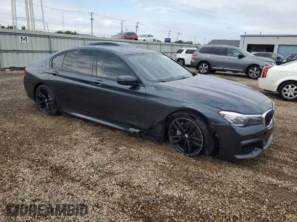 2019 BMW 7 Series 740i xDrive с VIN WBA7E4C54KGV70217, выставлен на аукционе Copart как лот 70487135 с пробегом 63 589 миль миль и Списание • Salvage title. История ставок и продаж доступна на DreamBid. Изображение 4.