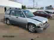 2002 Subaru Forester L with VIN JF1SF63532H752352, listed as a Copart auction lot 54620825 with 83,647 mi miles and Salvage title. Bid and sale history available at DreamBid. Image 4.