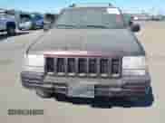 1996 Jeep Grand Cherokee Limited с VIN 1J4GZ78Y1TC299485, выставлен на аукционе IAAI как лот 42933493 с пробегом 209 166 миль миль и . История ставок и продаж доступна на DreamBid. Изображение 6.