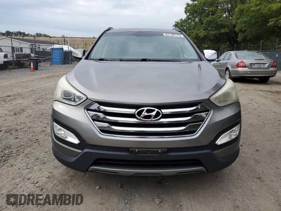 2013 Hyundai Santa Fe Sport с VIN 5XYZU3LB7DG014147, выставлен на аукционе Copart как лот 82160175 с пробегом 149 645 миль миль и Списание • Salvage title. История ставок и продаж доступна на DreamBid. Изображение 5.