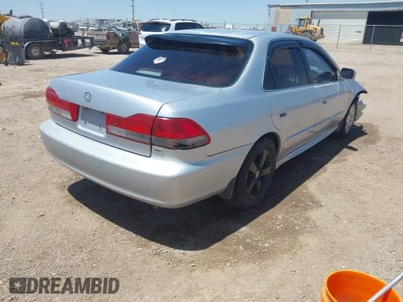 2002 Honda Accord EX with VIN 1HGCG16542A037388, listed as a IAAI auction lot 42299504 with 247,378 mi miles and . Bid and sale history available at DreamBid. Image 4.
