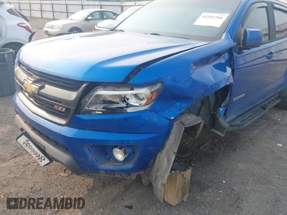 2018 Chevrolet Colorado 4WD Z71 with VIN 1GCGTDEN3J1327148, listed as a IAAI auction lot 42392306 with 70,932 mi miles and . Bid and sale history available at DreamBid. Image 6.