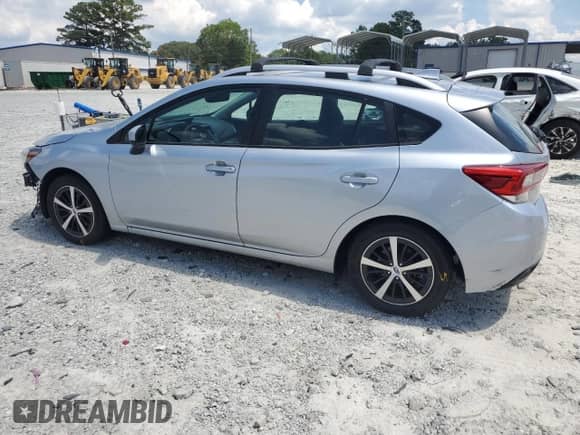 2023 Subaru Impreza Premium with VIN 4S3GTAD61P3705005, listed as a Copart auction lot 66817245 with 27,443 mi miles and Salvage title. Bid and sale history available at DreamBid. Image 2.