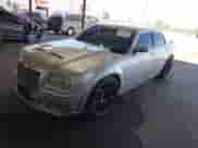 2006 Chrysler 300 C SRT-8 with VIN 2C3LA73W26H471000, listed as a IAAI auction lot 42884335 with 148,180 mi miles and . Bid and sale history available at DreamBid. Image 2.